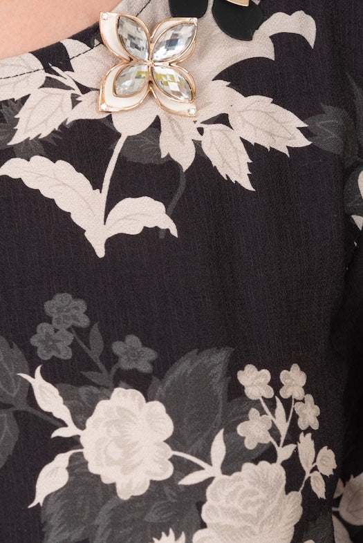 abito con rose e cintura